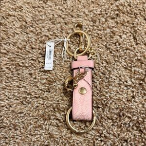 Coach trigger snap bag charm powder pink